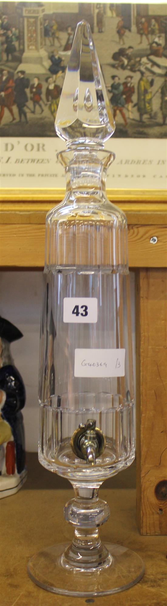 Glass decanter with tap
